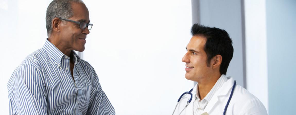 male patient talking to doctor