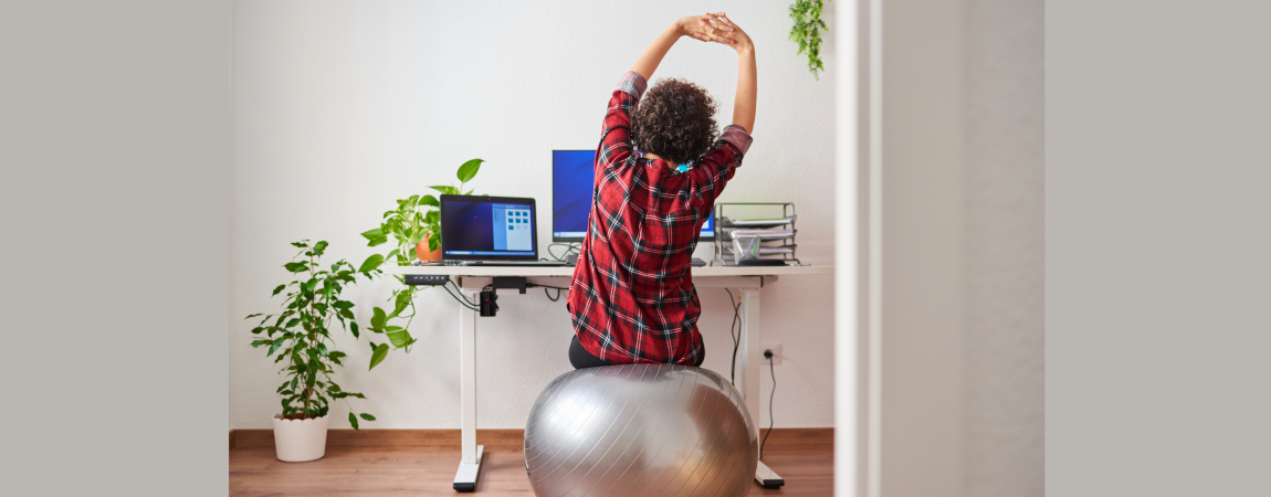 woman exercising at her desk
