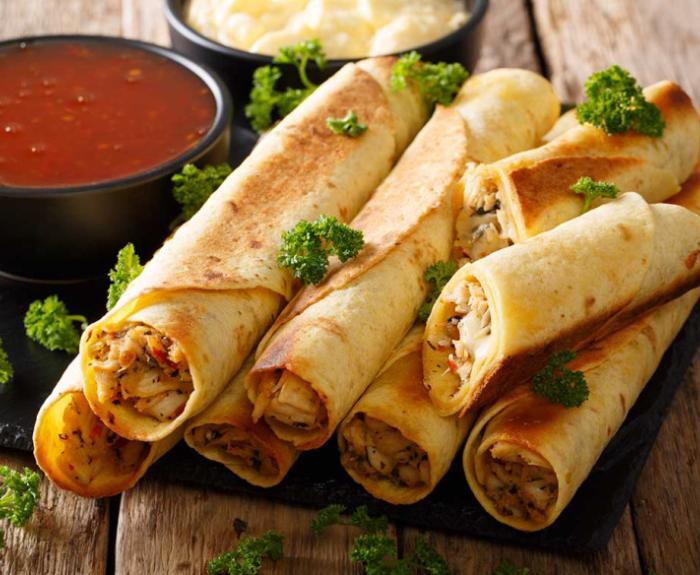 chicken taquitos on a plate